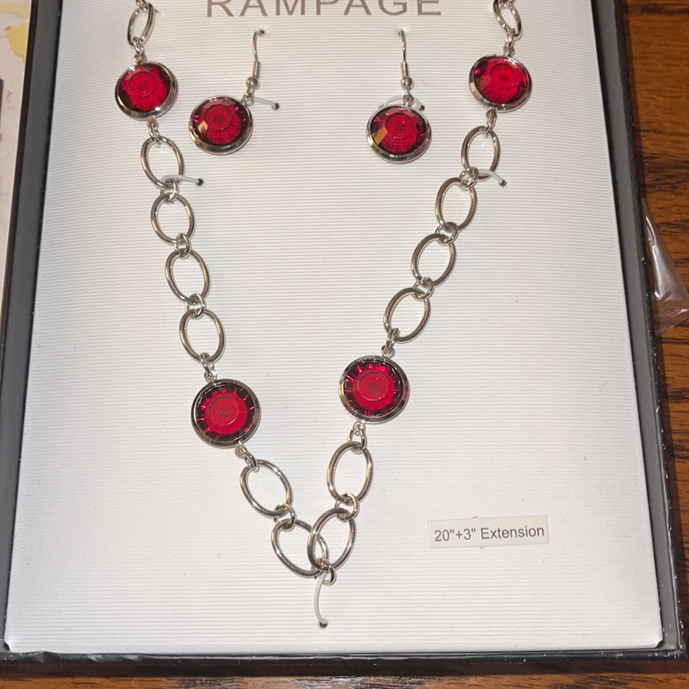 Brand new silver with red jewels earrings and necklace set